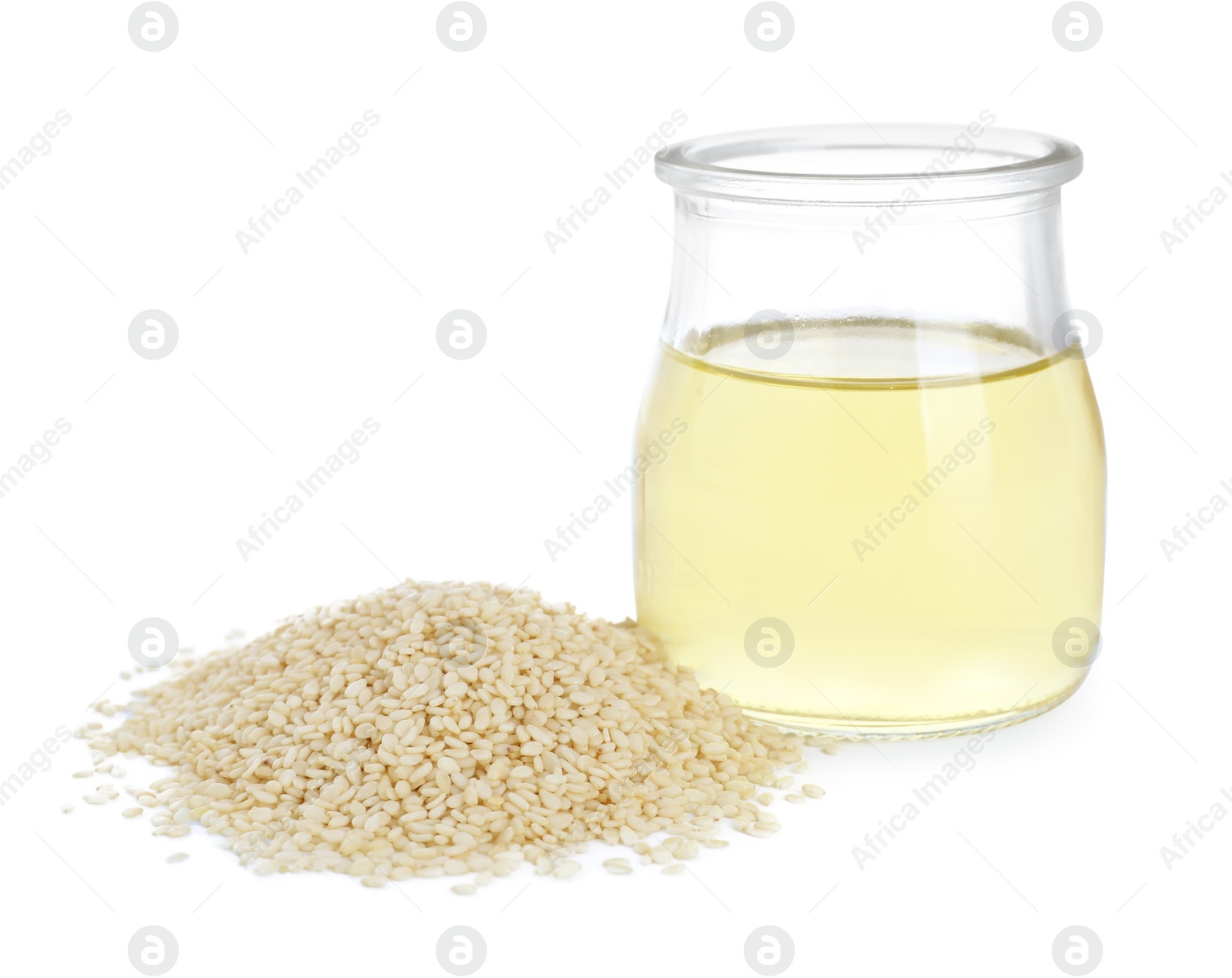 Photo of Glass jar with fresh sesame oil and seeds isolated on white