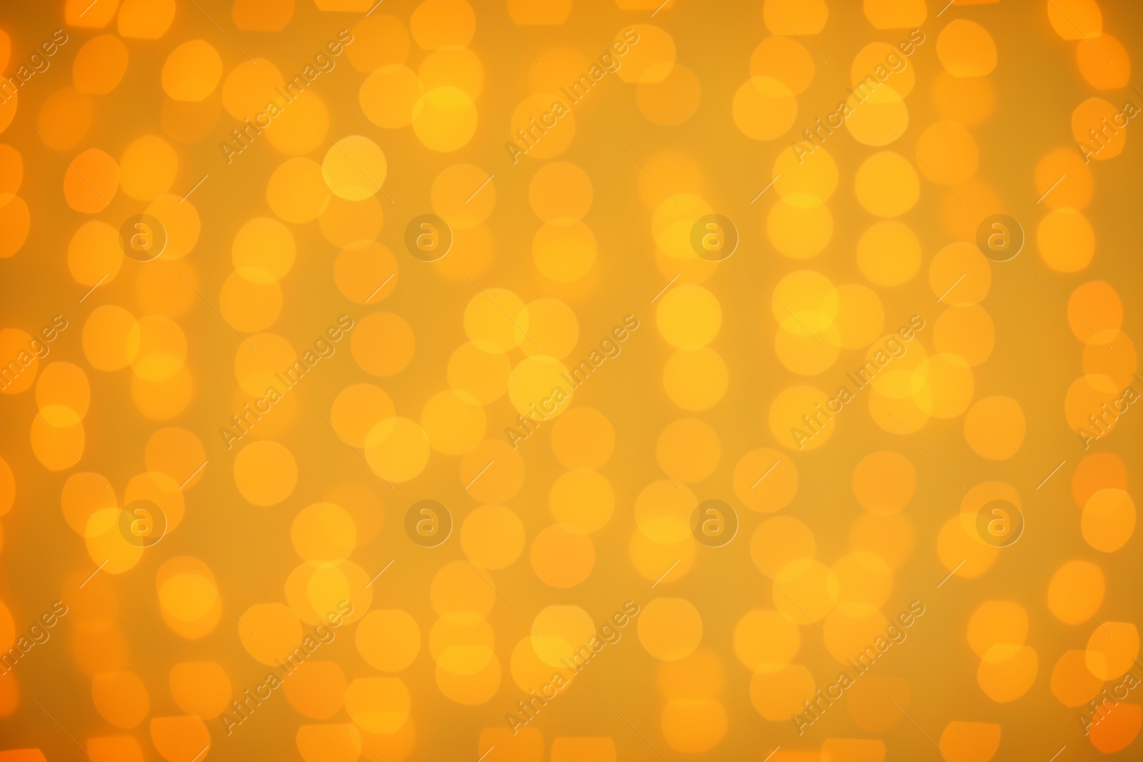 Photo of Beautiful gold lights as background. Bokeh effect