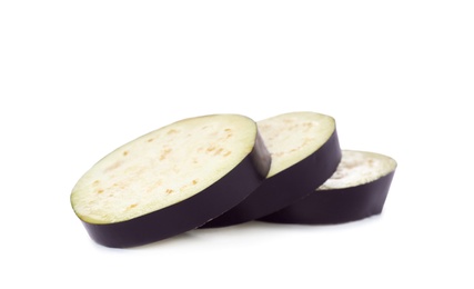 Photo of Slices of ripe eggplant on white background