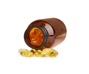 Photo of Jar with vitamin capsules isolated on white