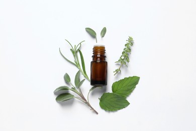 Bottle of essential oil and different herbs on white background, flat lay