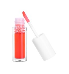 Photo of Bright lip gloss and applicator isolated on white. Cosmetic product