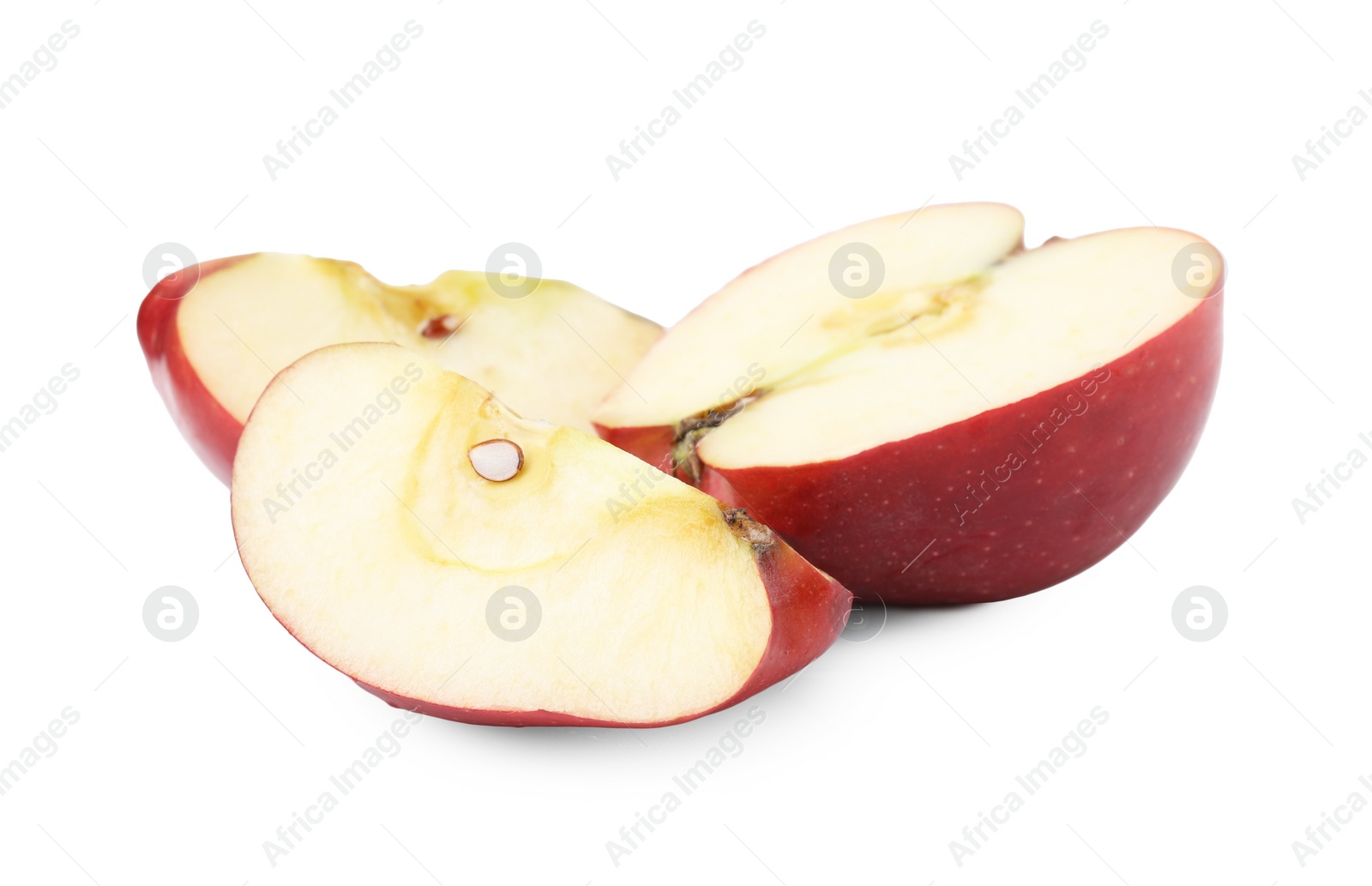 Photo of Pieces of ripe red apple isolated on white