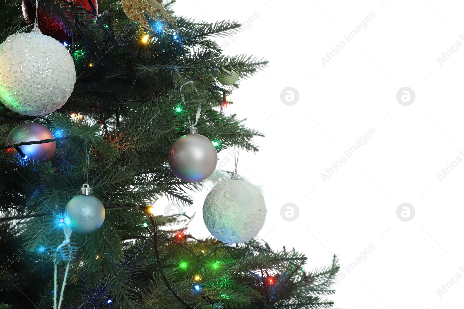 Photo of Christmas tree with beautiful decorations on white background, closeup