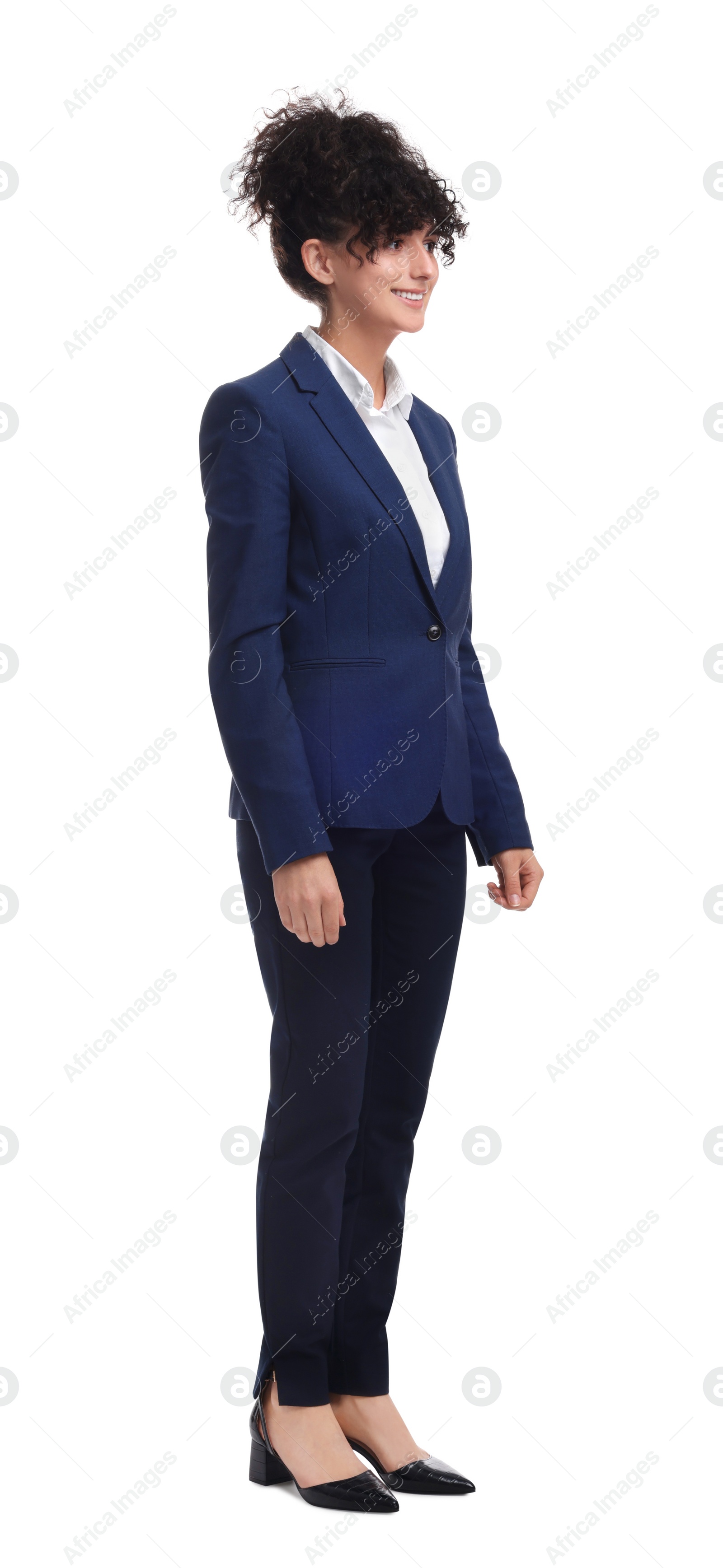 Photo of Young businesswoman in suit standing on white background