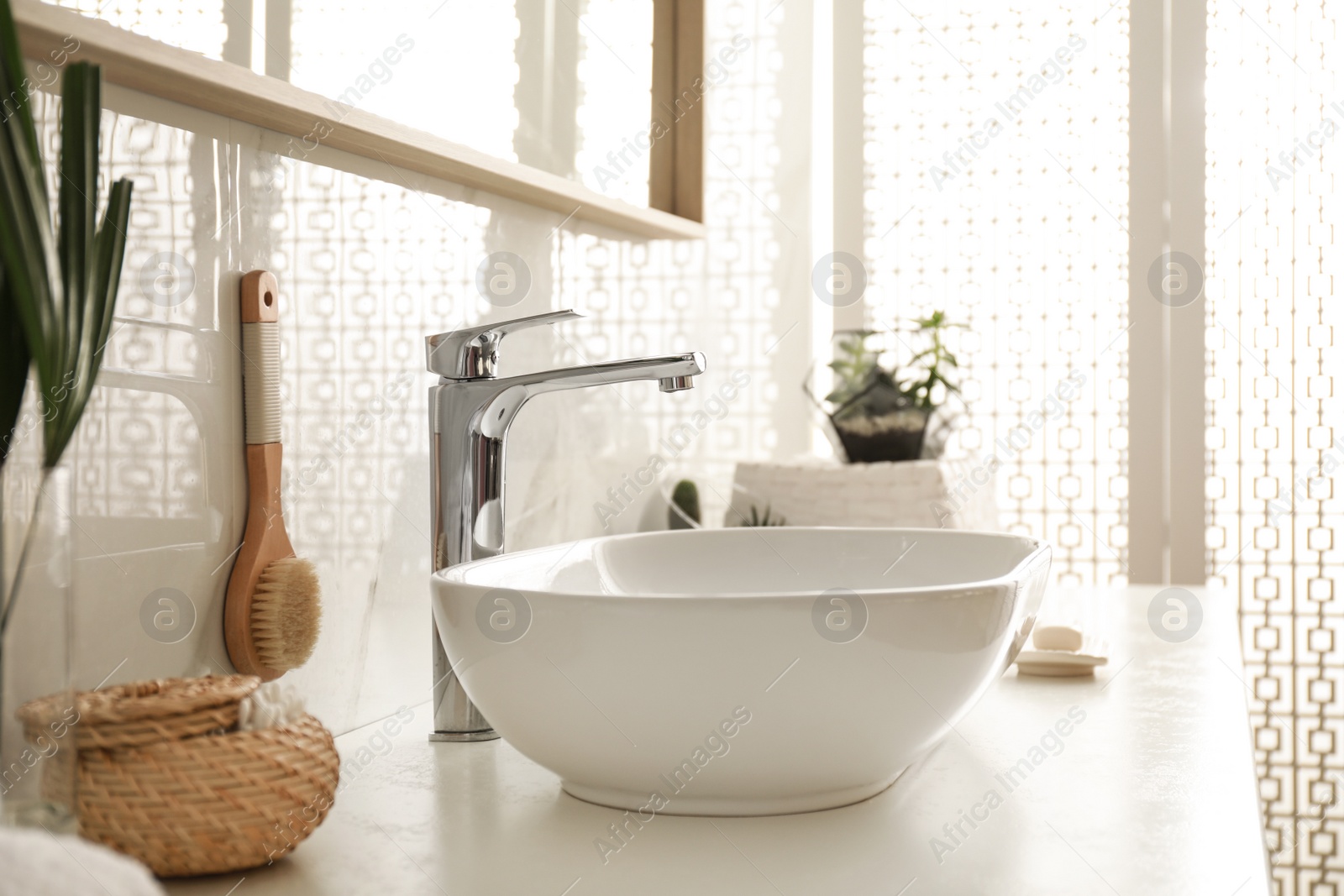 Photo of Stylish white sink in modern bathroom interior