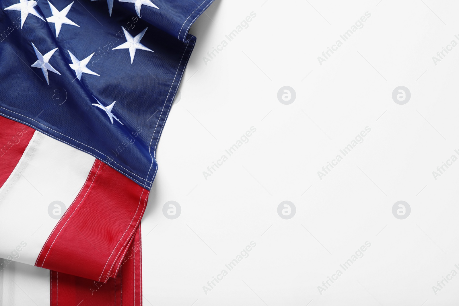 Photo of National flag of America isolated on white, top view