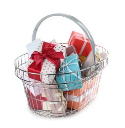 Photo of Shopping basket full of gift boxes on white background