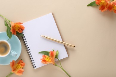 Guest list. Notebook, pen, coffee and beautiful flowers on beige table, flat lay. Space for text