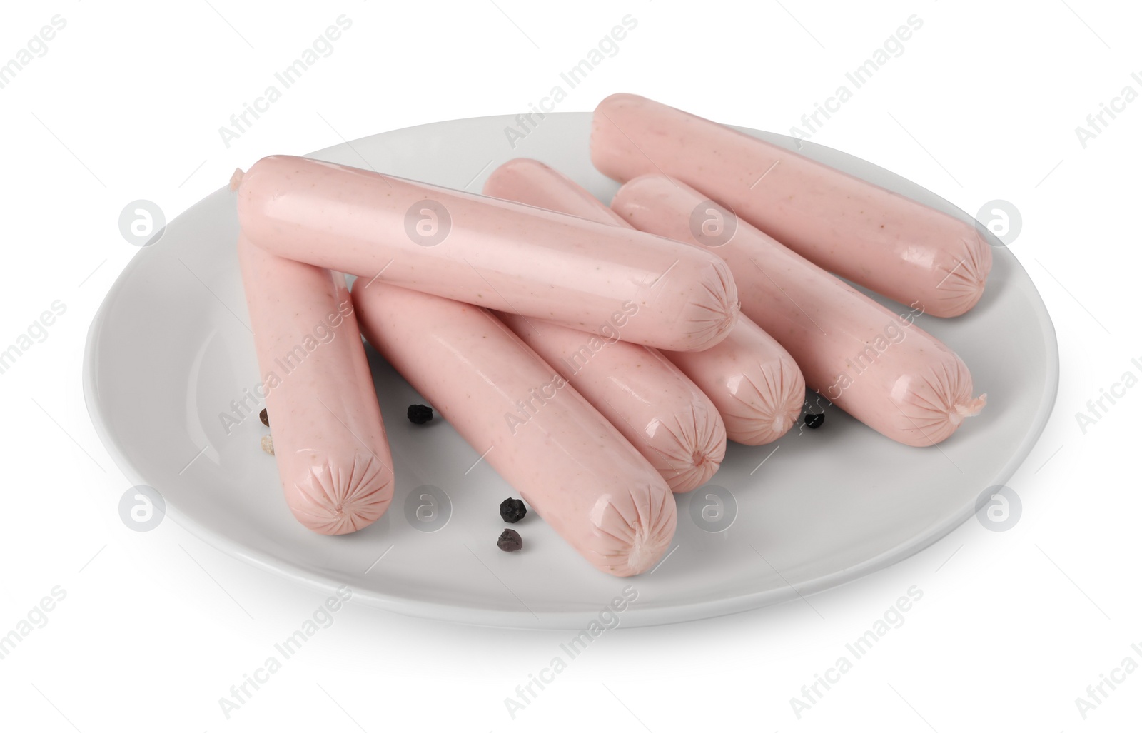 Photo of Plate with many raw sausages isolated on white. Vegan meat product