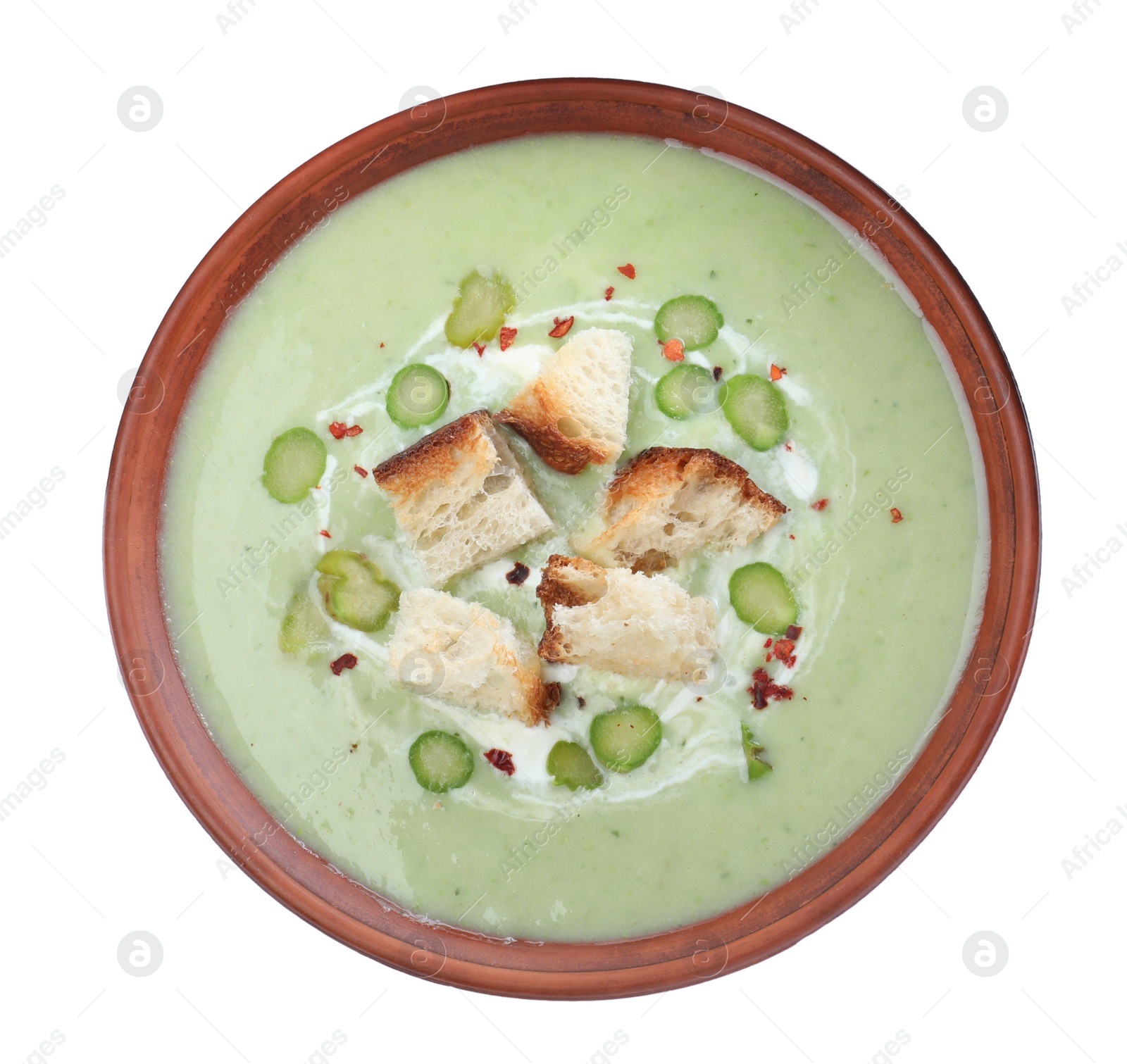 Photo of Delicious asparagus soup with croutons on white background, top view