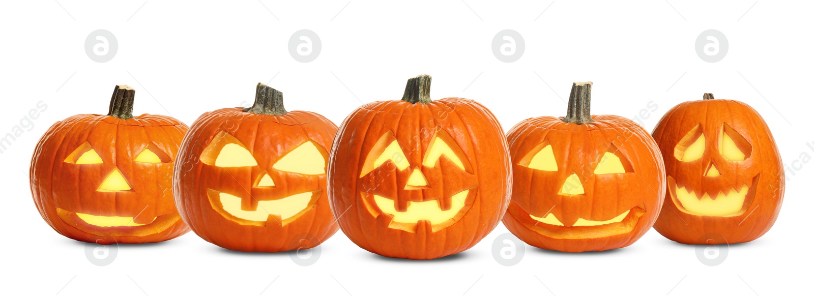 Image of Set of carved Halloween pumpkins on white background. Banner design