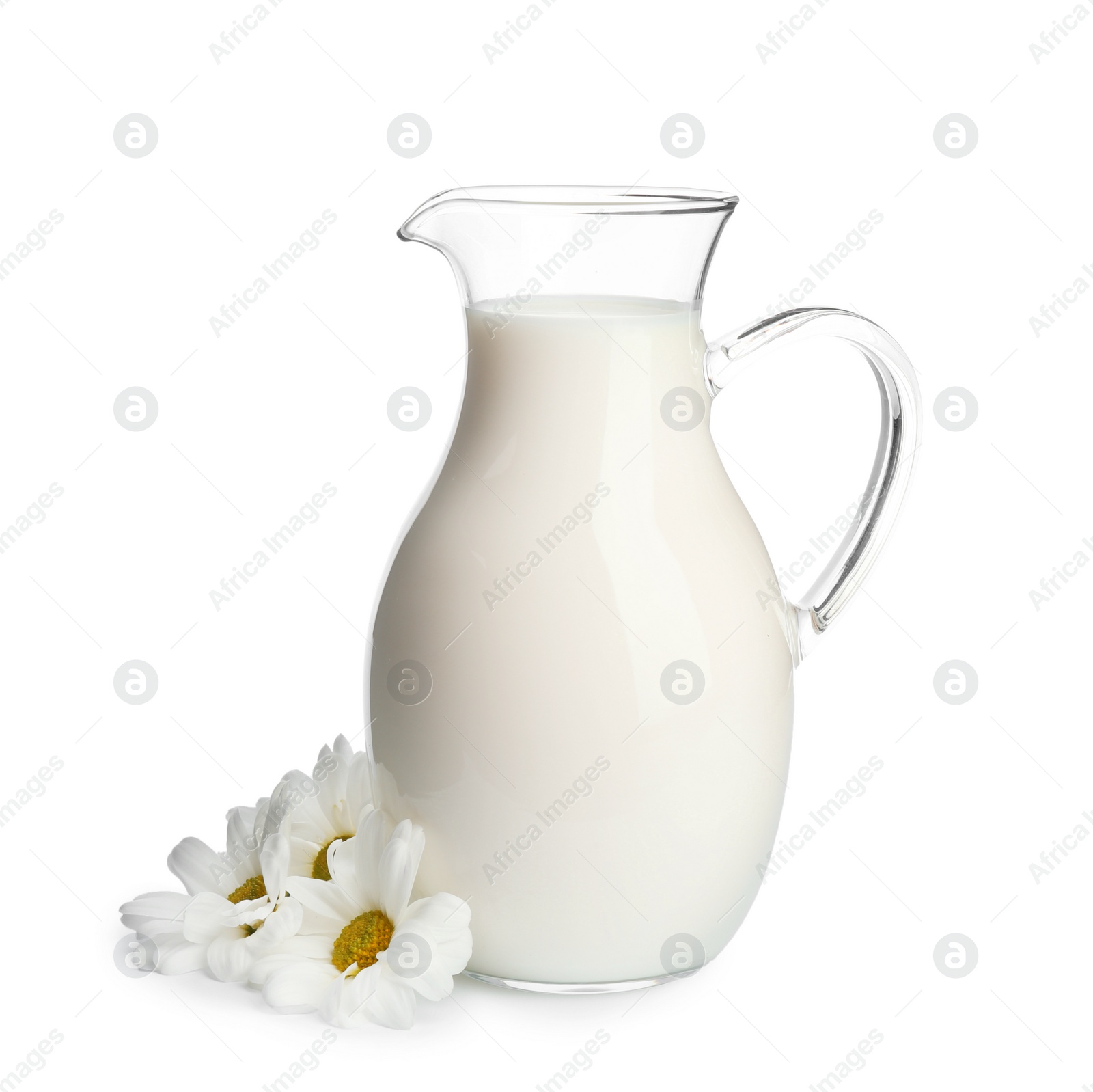 Photo of Jug with milk and flowers on white background