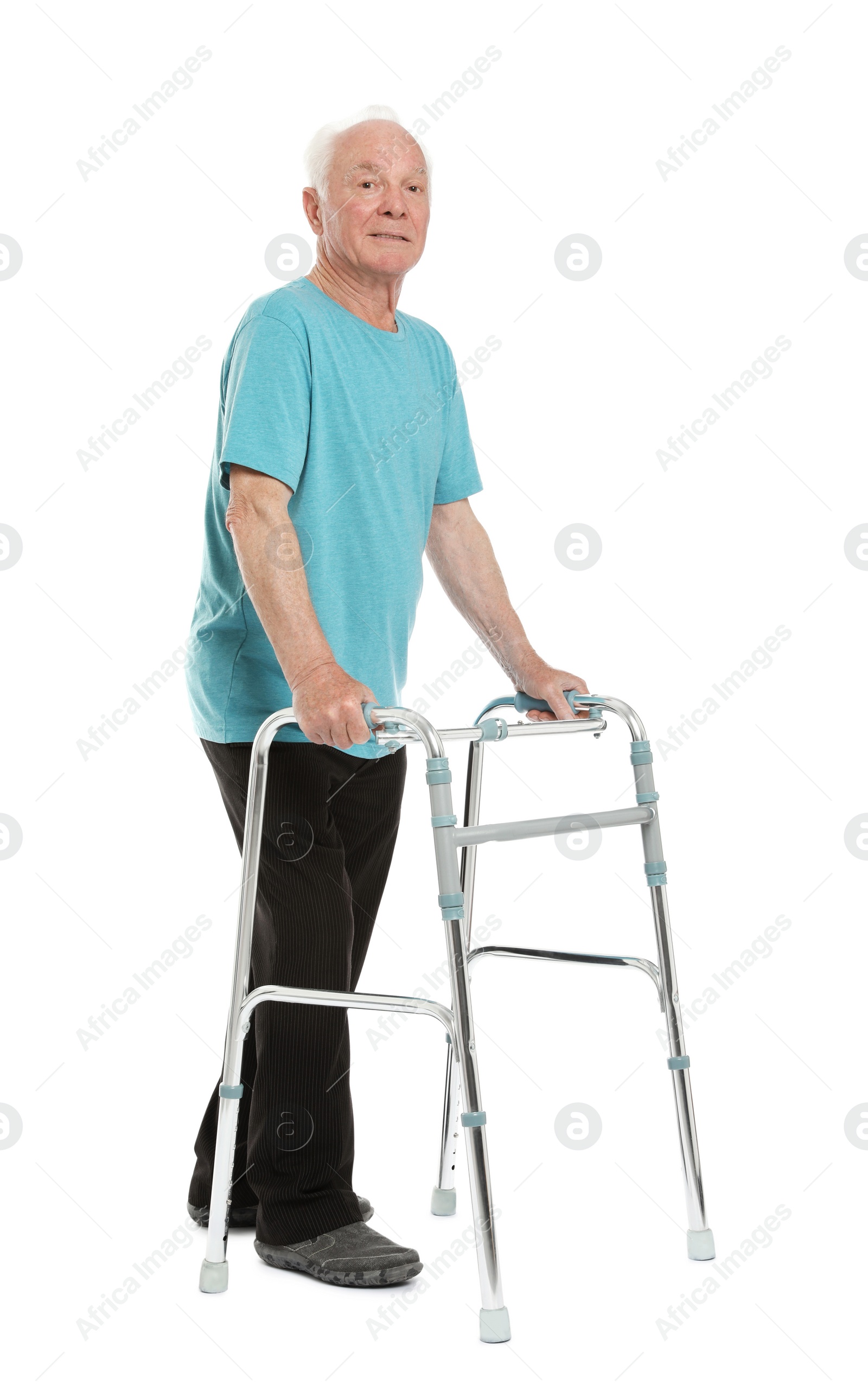 Photo of Full length portrait of elderly man using walking frame isolated on white