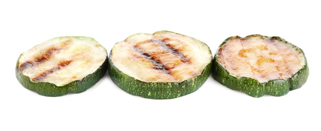 Photo of Delicious grilled zucchini slices on white background