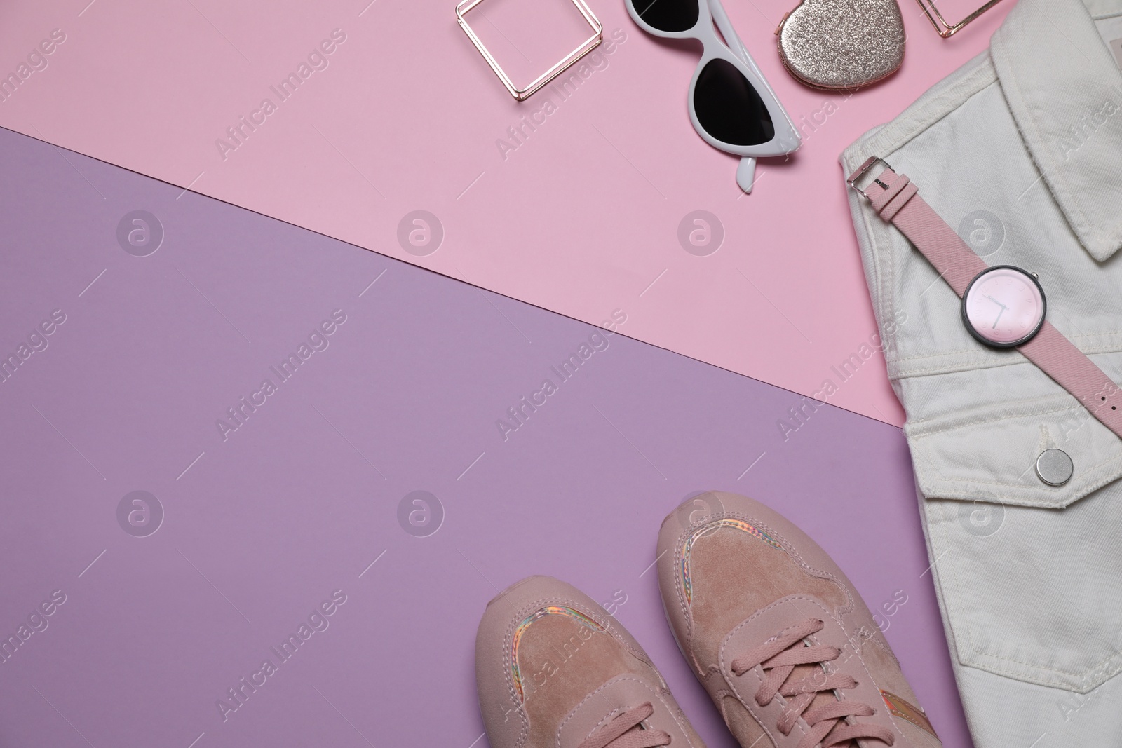 Photo of Flat lay composition with stylish clothes and accessories on color background. Space for text