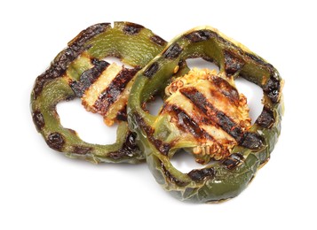 Photo of Slices of grilled green chili pepper isolated on white