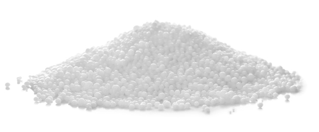 Photo of Pile of granular mineral fertilizer isolated on white