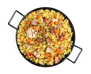 Photo of Delicious pilaf with meat, carrot and garlic isolated on white, top view