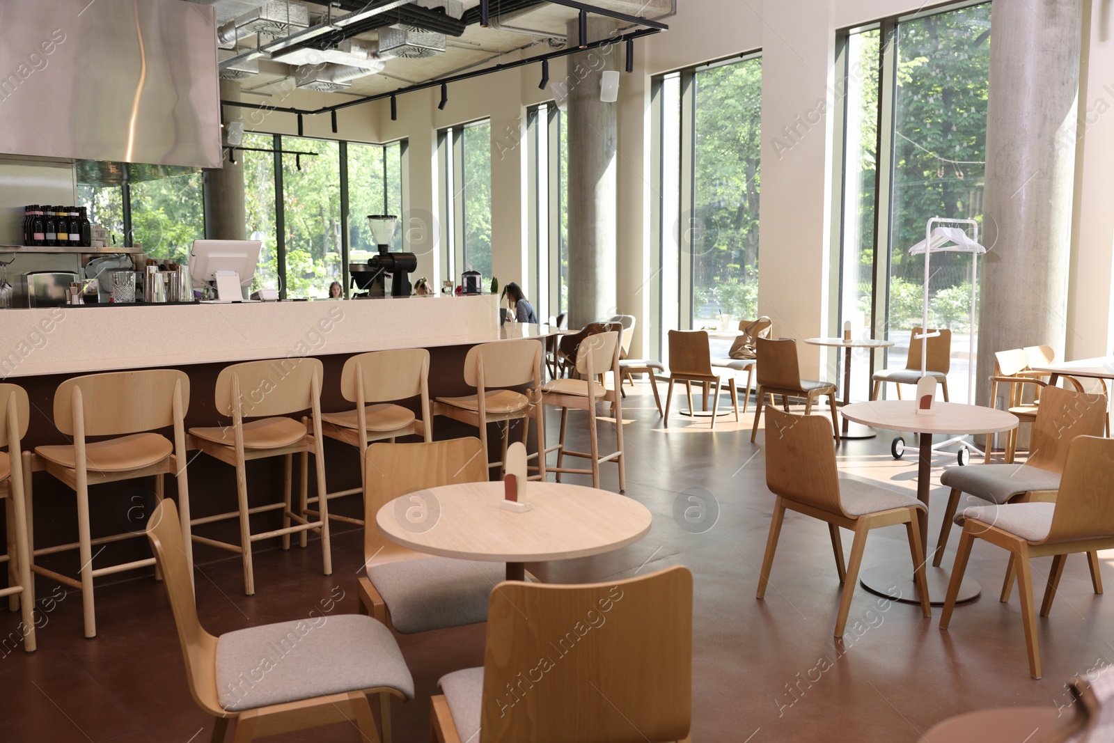 Photo of Modern cafe with stylish furniture. Interior design