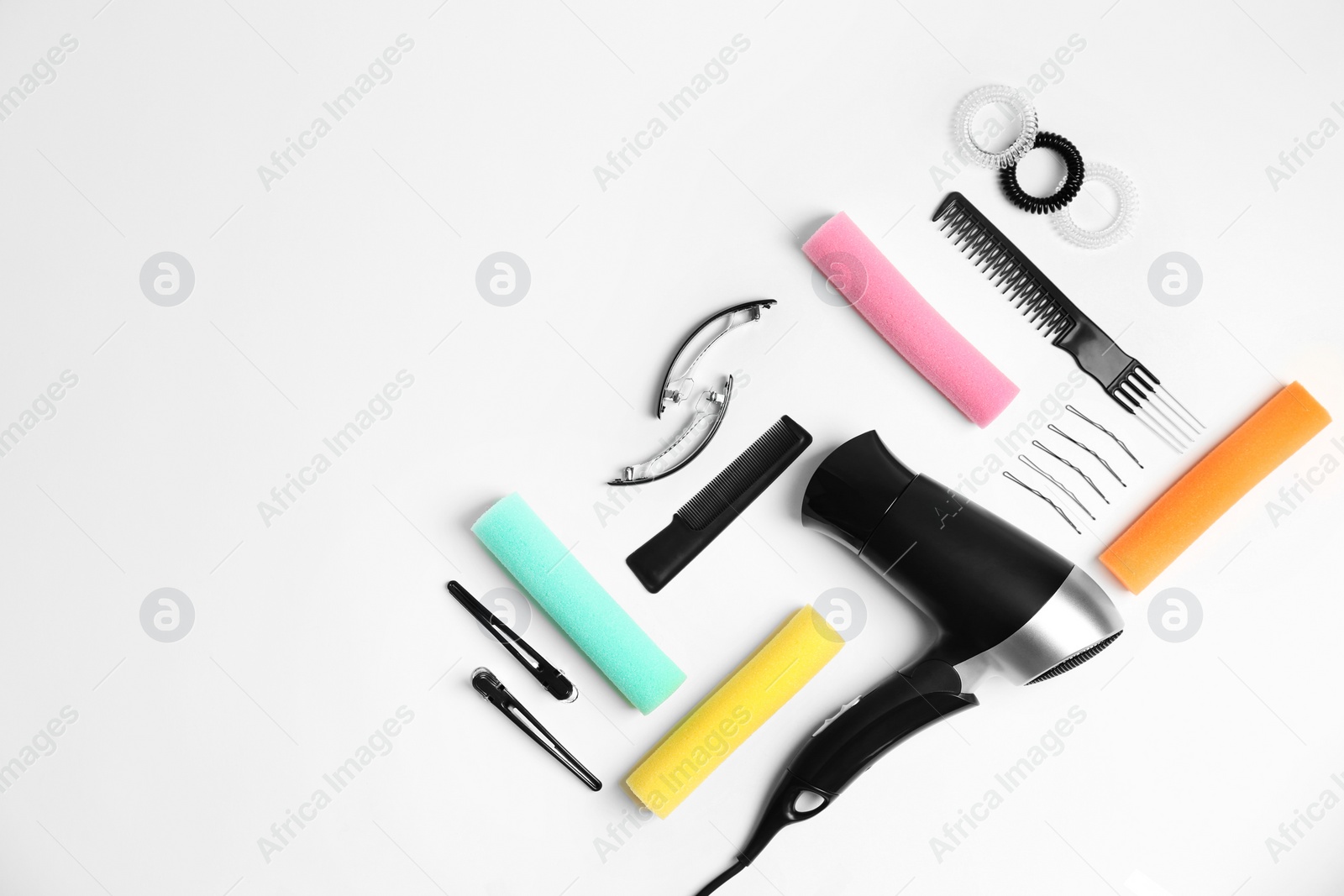 Photo of Professional hairdresser tools on white background