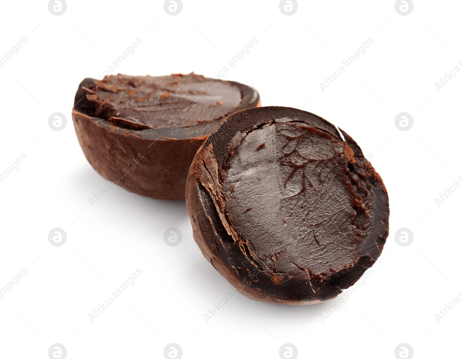 Photo of Delicious raw chocolate truffle on white background