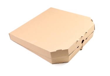 Photo of Cardboard pizza box on white background. Mockup for design