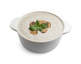 Photo of Fresh homemade mushroom soup in ceramic pot isolated on white