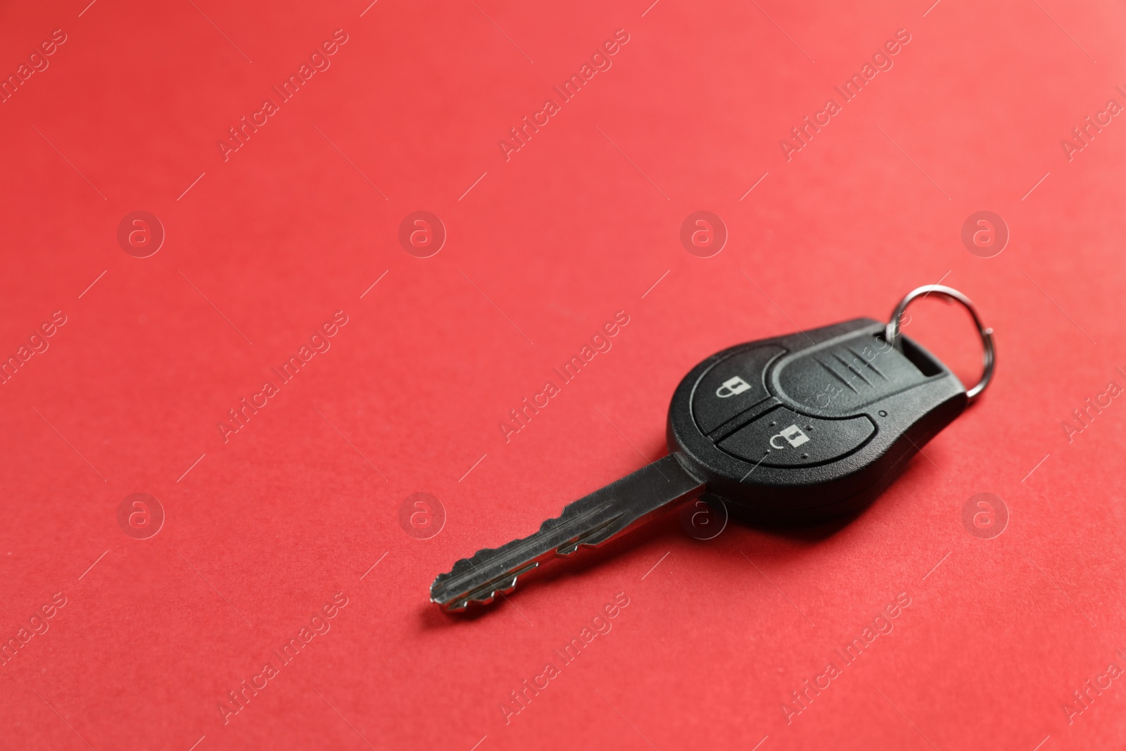 Photo of Car key on color background. Space for text