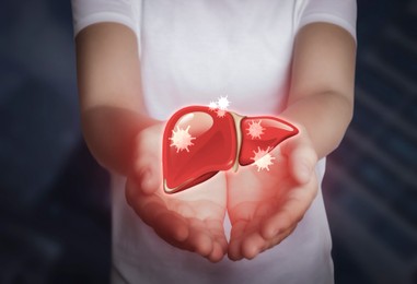 Woman and illustration of unhealthy liver on dark background. Viral hepatitis