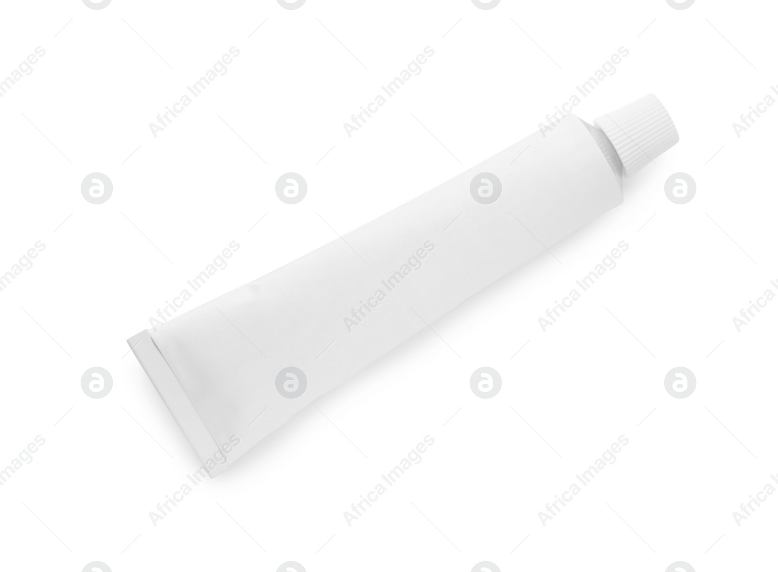 Photo of Blank tube of ointment isolated on white, top view