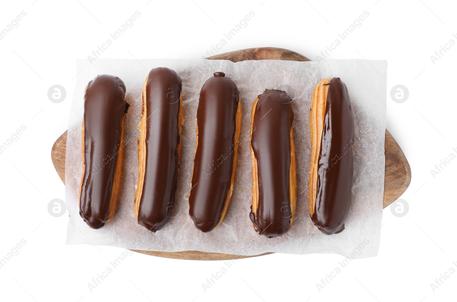 Photo of Delicious eclairs covered with chocolate isolated on white, top view
