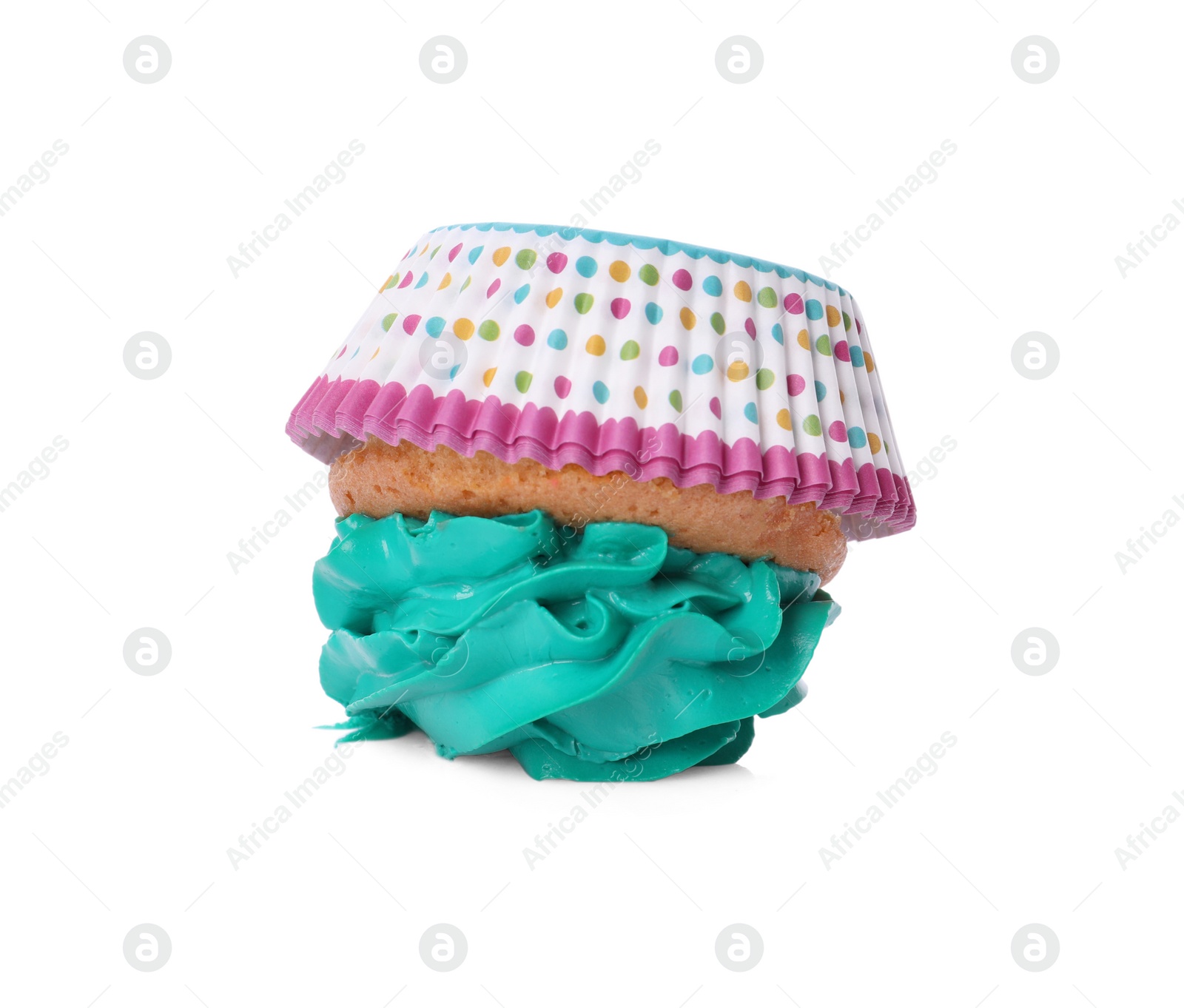 Photo of Dropped cupcake with cream on white background. Troubles happen