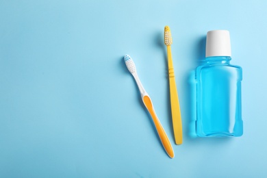 Flat lay composition with oral care products and space for text on color background. Teeth hygiene