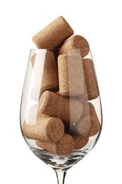 Photo of Glass full of wine corks on white background, closeup