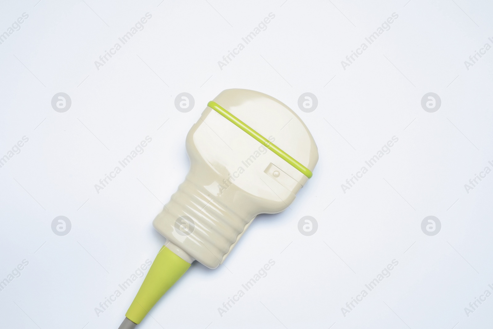 Photo of Ultrasonic transducer on light background, top view