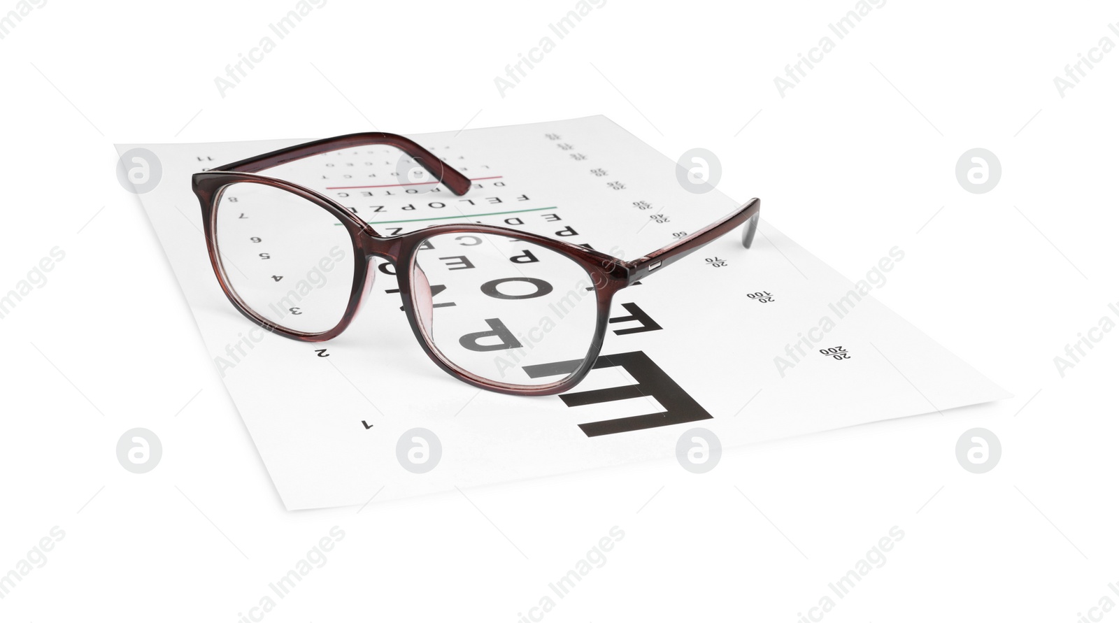 Photo of Glasses and vision test chart isolated on white