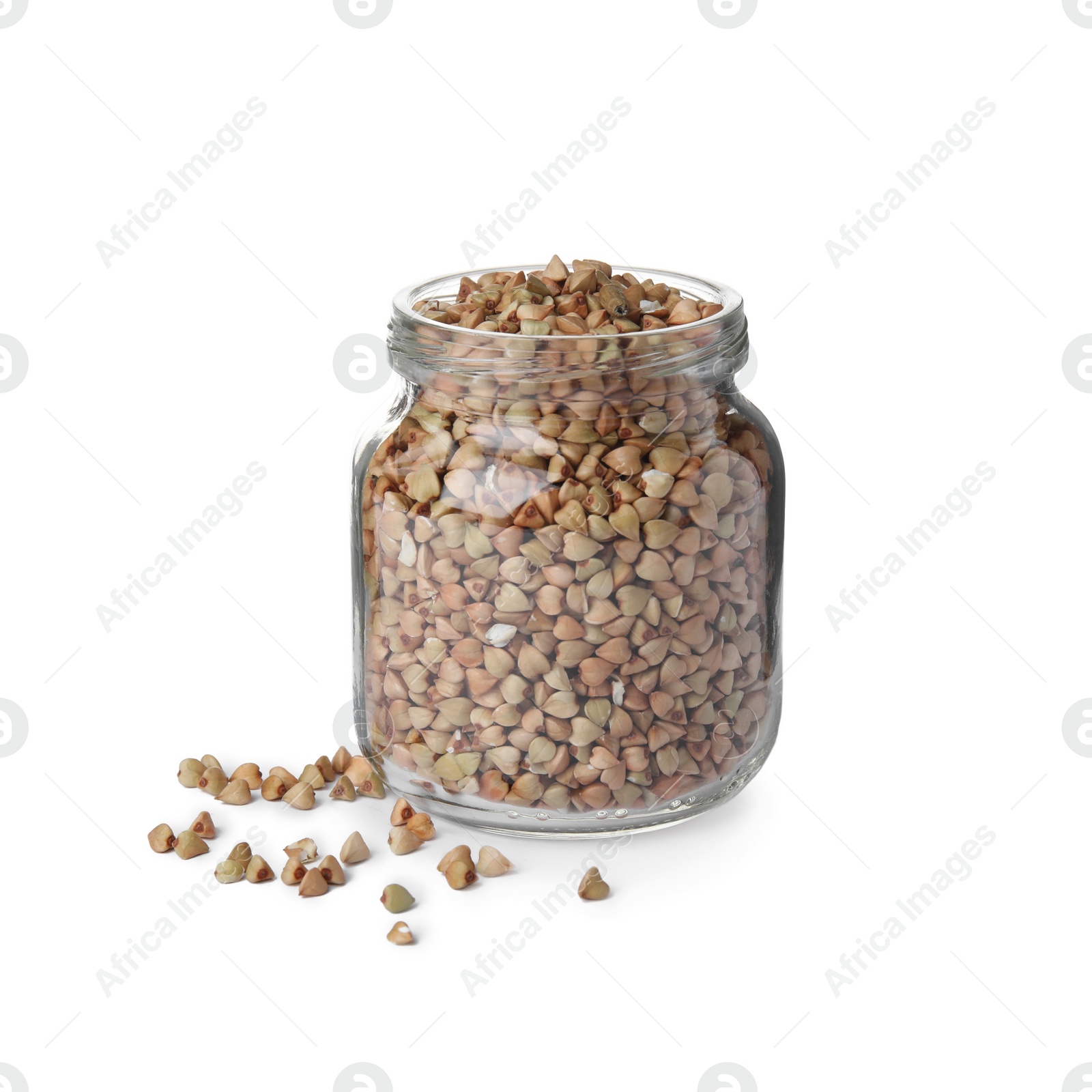 Photo of Organic green buckwheat in glass jar isolated on white