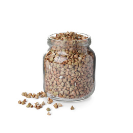 Photo of Organic green buckwheat in glass jar isolated on white