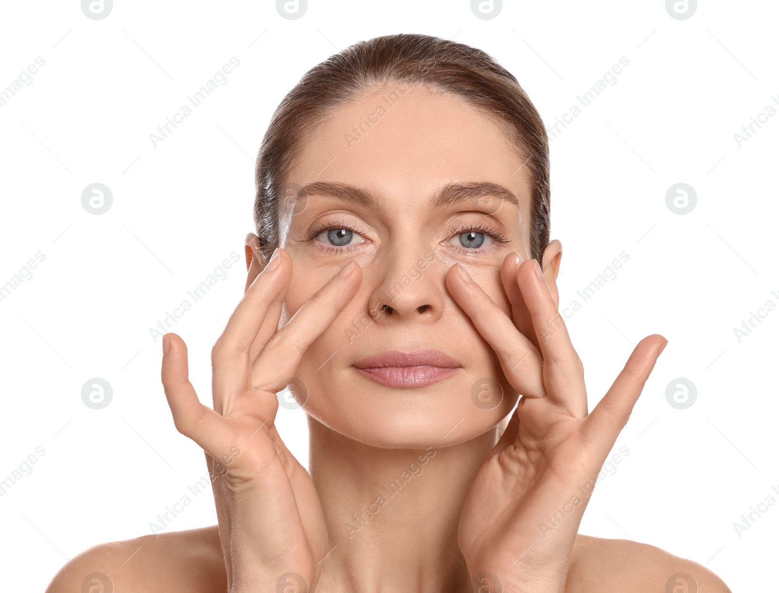 Photo of Woman massaging her face on white background