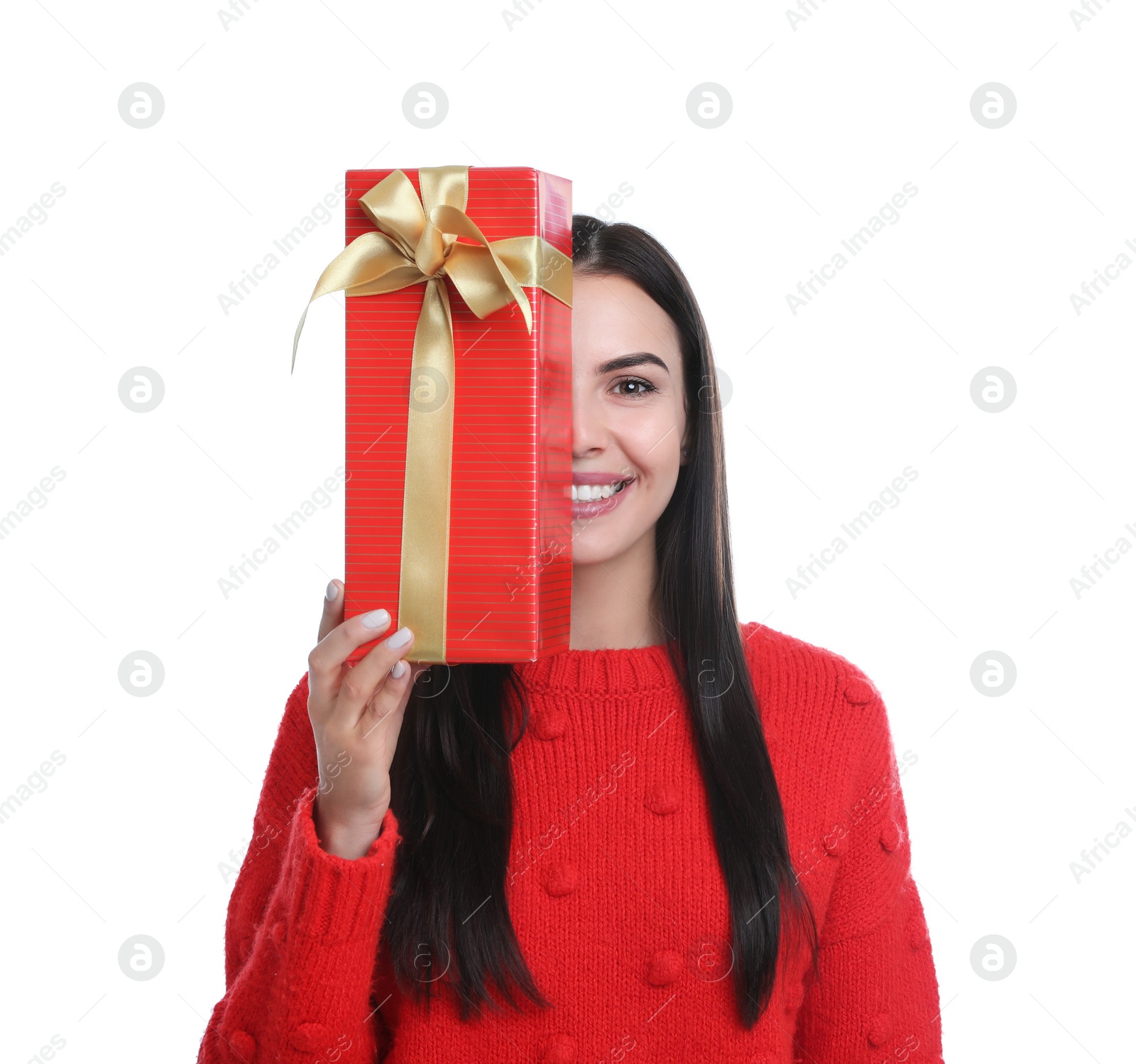 Photo of Happy young woman holding Christmas gift on white background