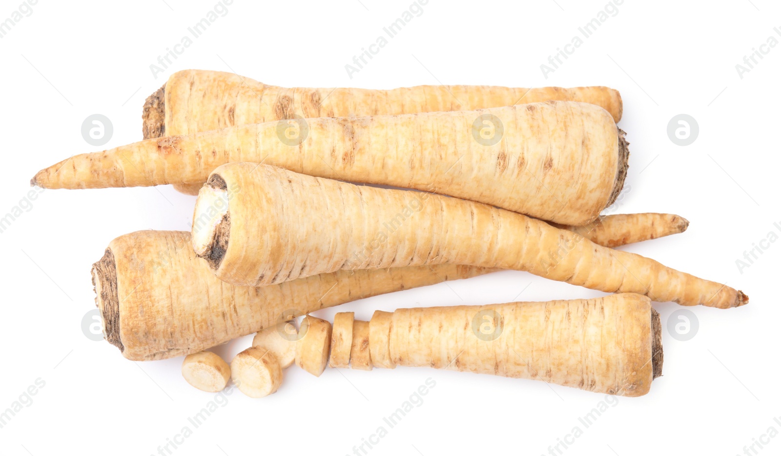 Photo of Raw parsley roots isolated on white, top view