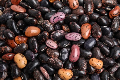 Photo of Heapraw beans as background, top view. Veggie seeds