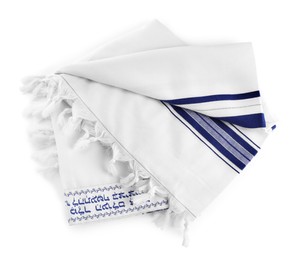 Photo of Tallit with text Blessed are You, Lord our God, King of the universe, who has sanctified us with His commandments, and commanded us to enwrap ourselves in Tzitzit in Hebrew isolated on white, top view. Garment for Rosh Hashanah celebration