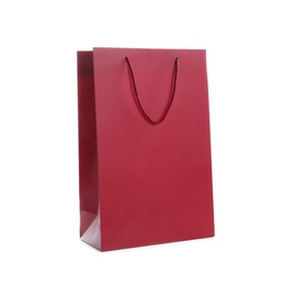 Photo of Burgundy paper shopping bag isolated on white