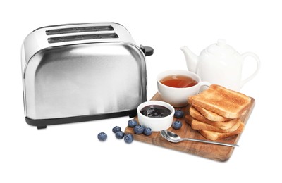 Photo of Toaster, bread with jam, blueberries and tea on white background