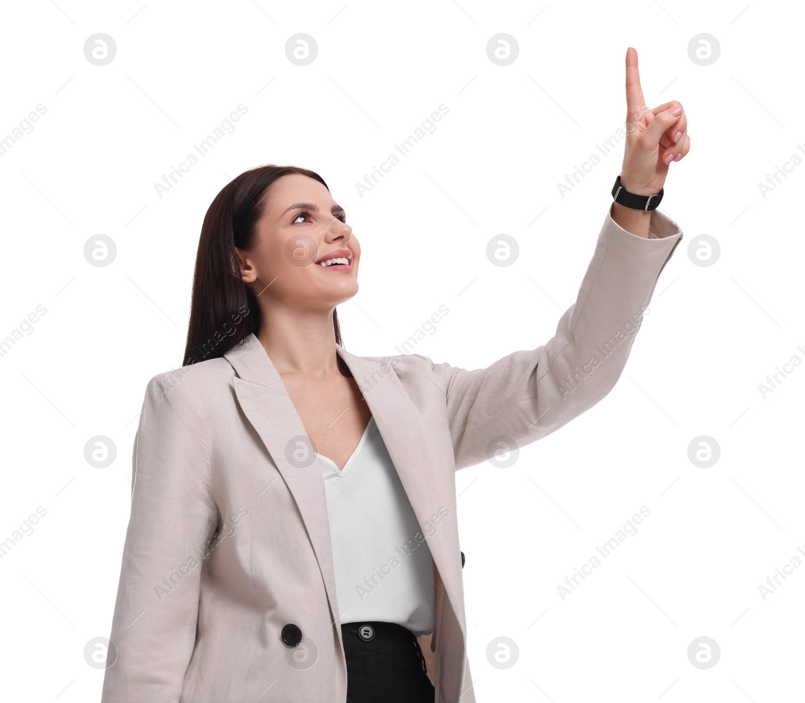 Photo of Beautiful businesswoman in suit pointing at something on white background, low angle view