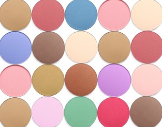 Image of Collage of beautiful different eye shadow refill pans on white background