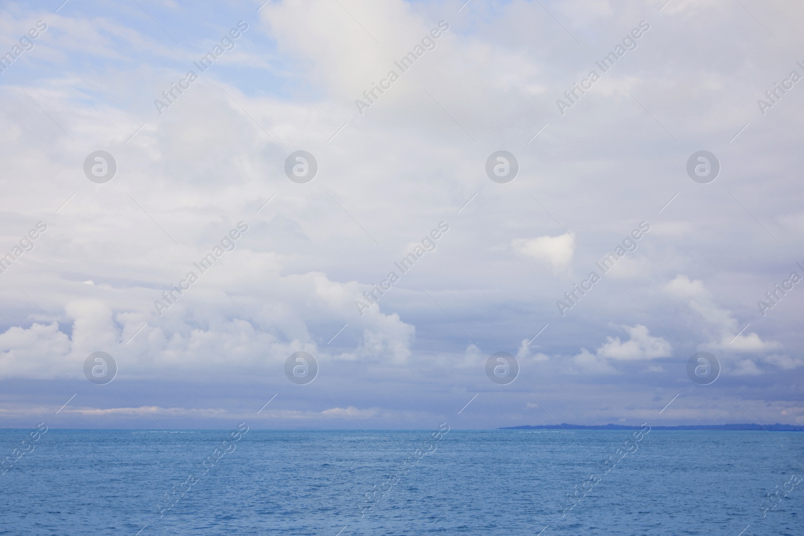 Photo of Picturesque view of sea under cloudy sky