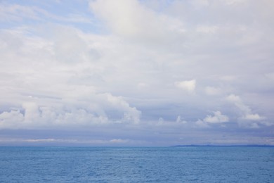 Picturesque view of sea under cloudy sky